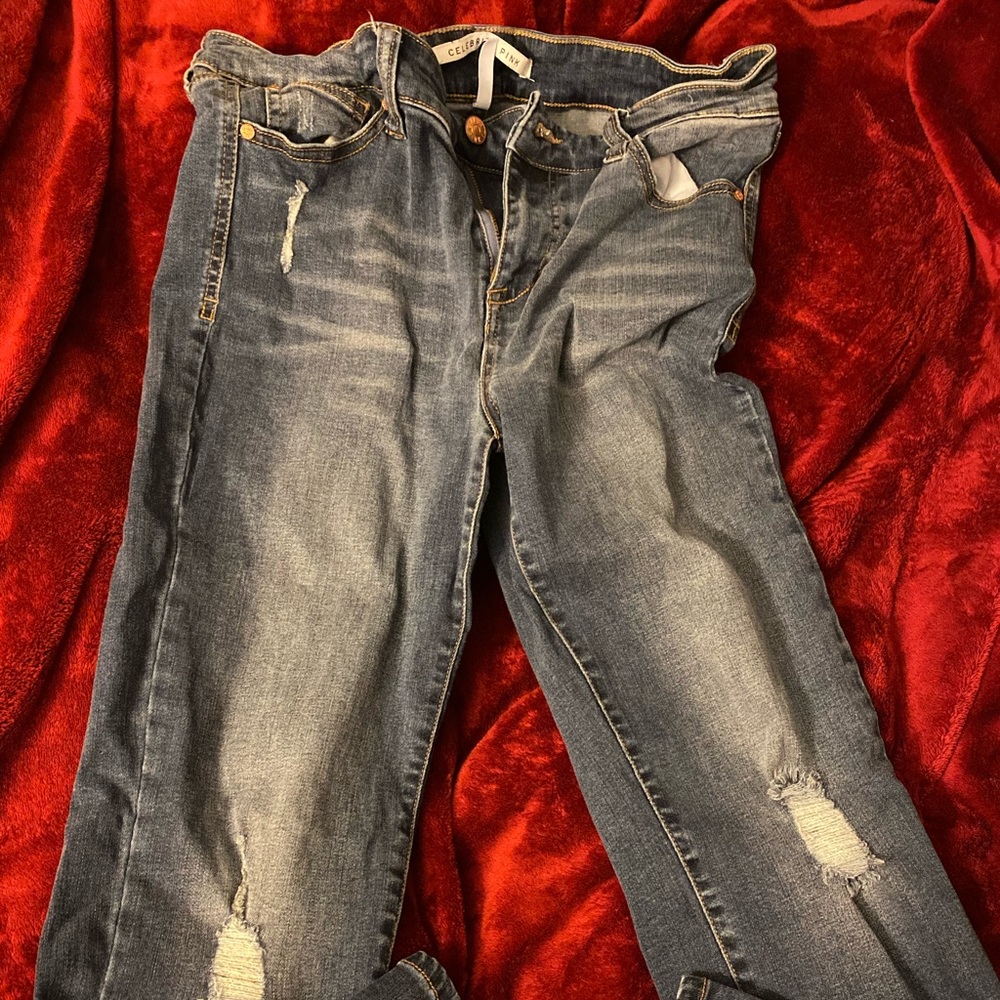 Semi ripped blue jeans